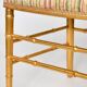 Pair of golden wood chairs in a bamboo style.
