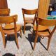 6 vintage 1960s wooden bistro chairs with camel faux leather.