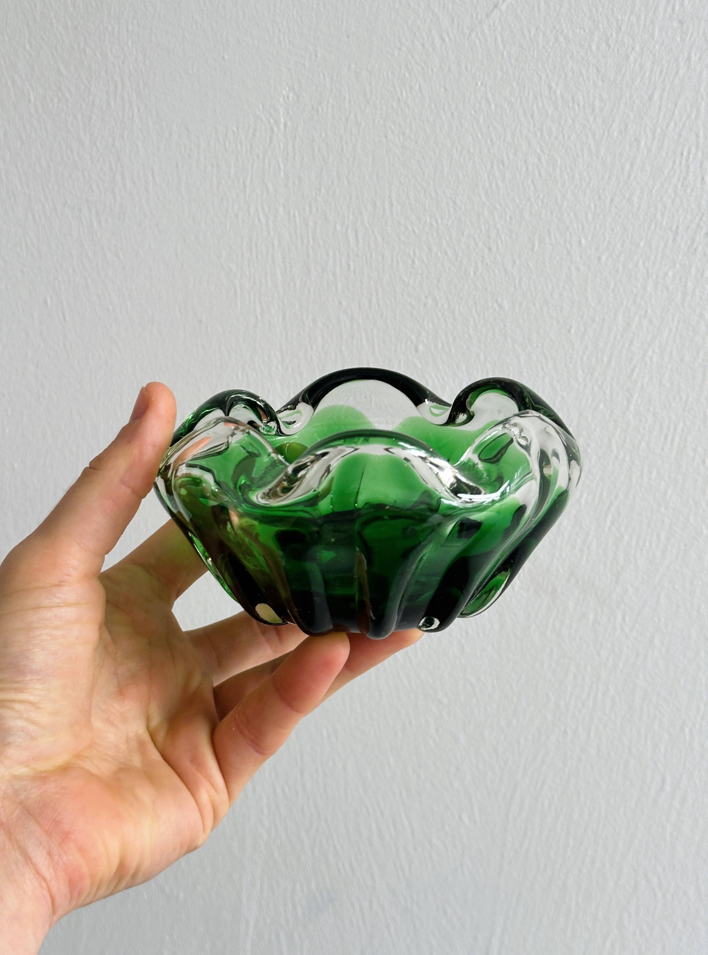 Translucent green ashtray.