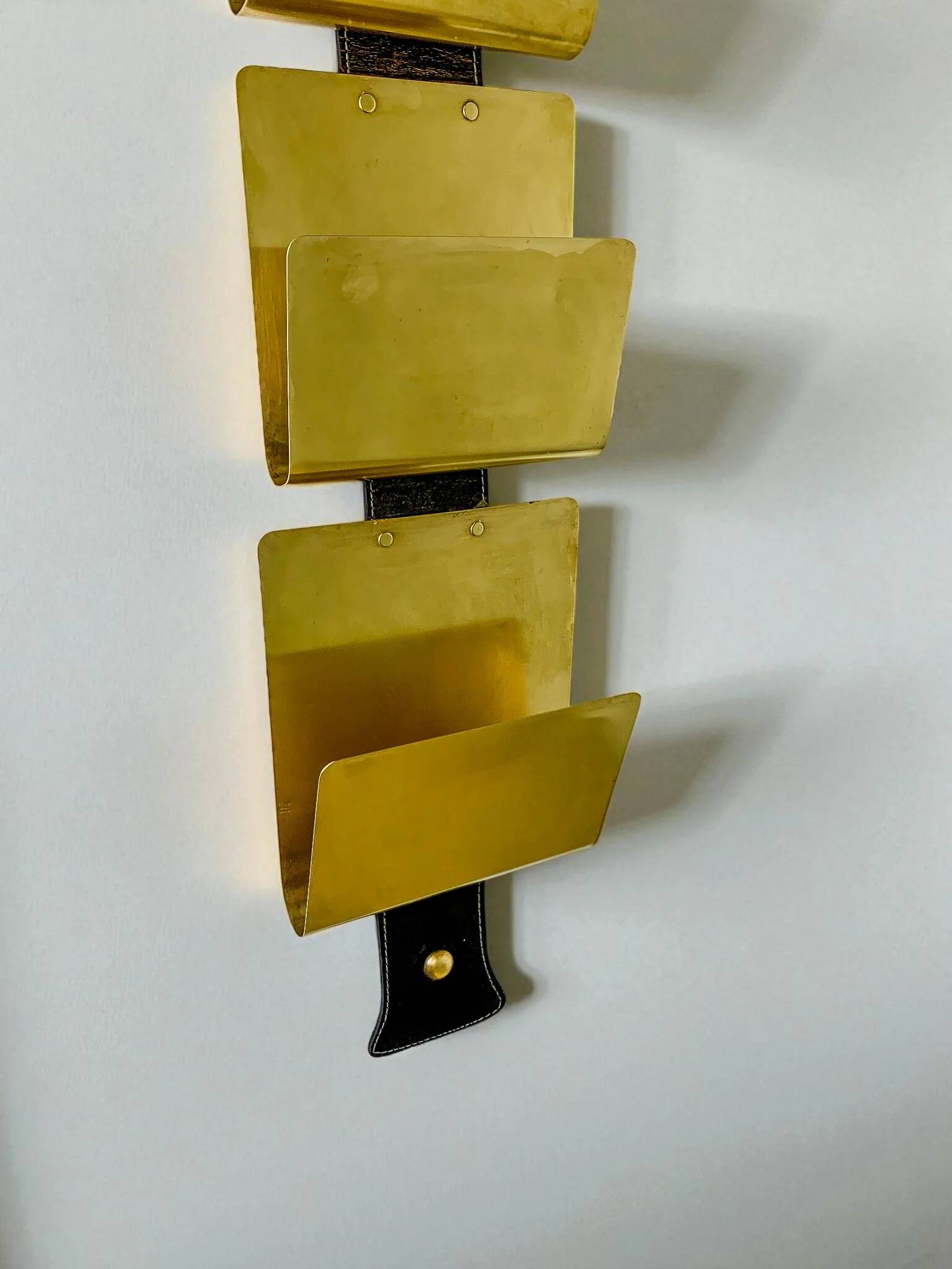 Valenti brass & leather wall-mounted magazine rack, Spain, 1970s