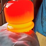 Vintage lamp of the 70s in orange opaline