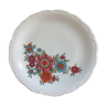 Round dish with a festooned edge, typical of the 70s