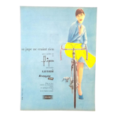 Paper advertisement dress tergal woman bicycle bicycle from a magazine of time