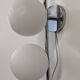Double Space Age wall light in frosted white glass, France circa 1970.