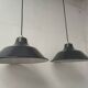 Pair of enamelled sheet metal suspensions