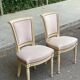 2 chaises Louis XVI en bois beige rembourrées