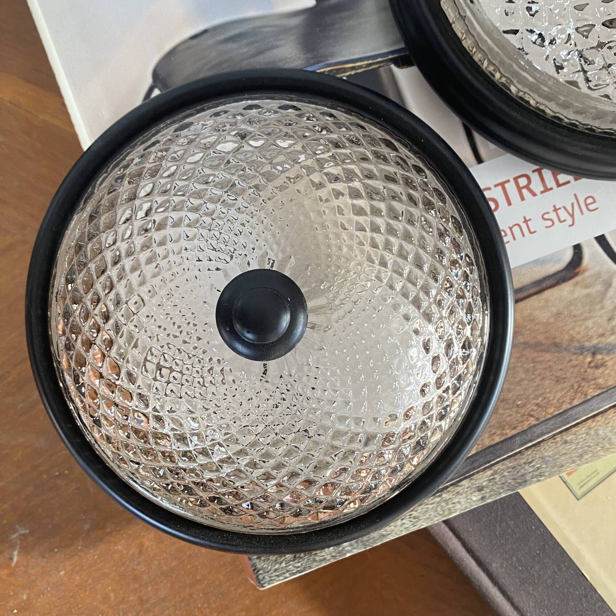 Small pair of vintage ceiling sconces in glass and black metal.