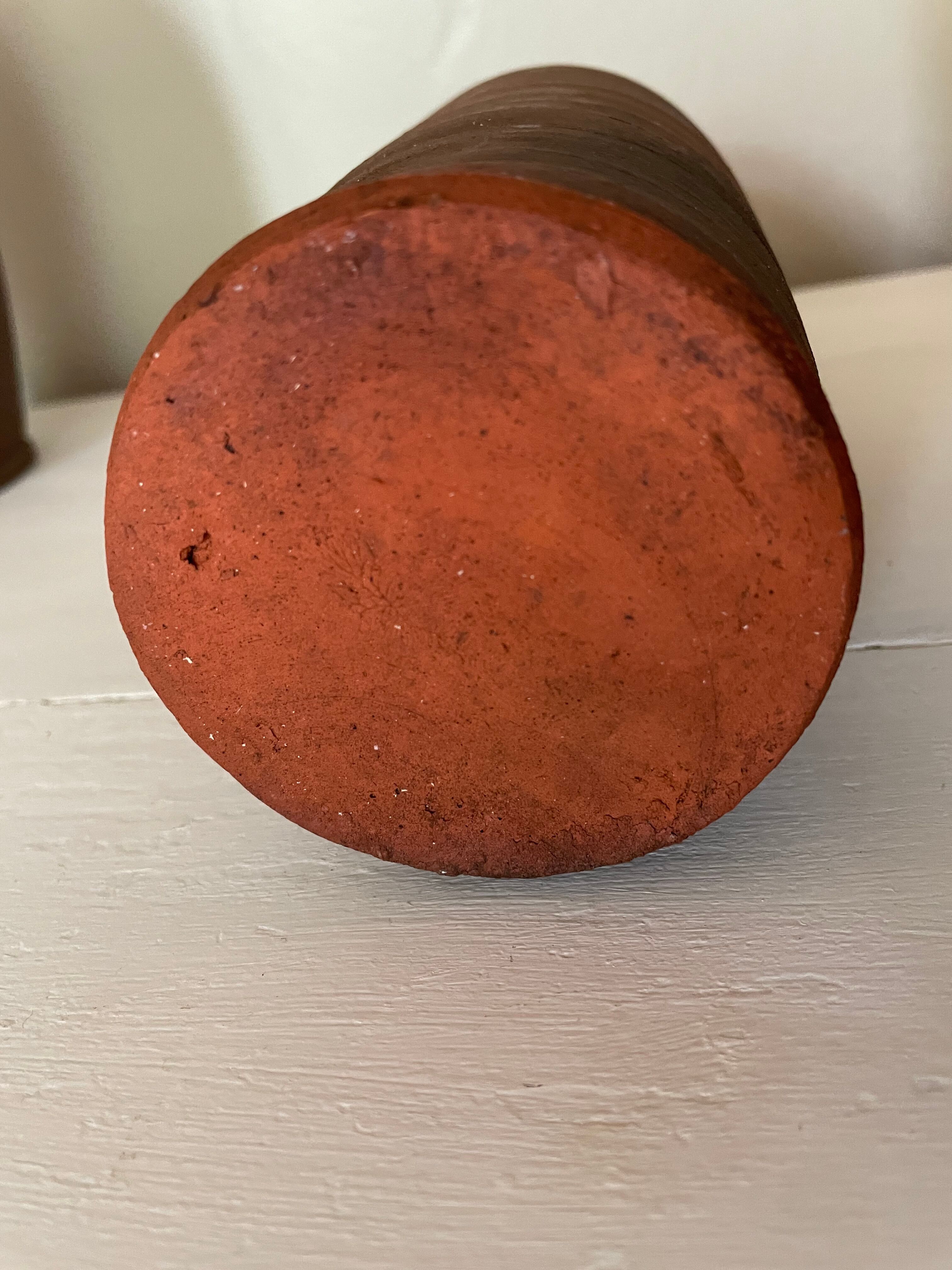 Jar and terracotta bottle