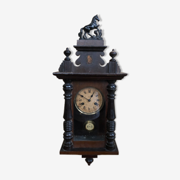 Mechanical pendulum clock with carved wood balance wheel & glass key