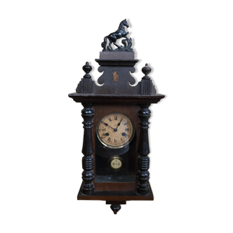 Mechanical pendulum clock with carved wood & glass pendulum