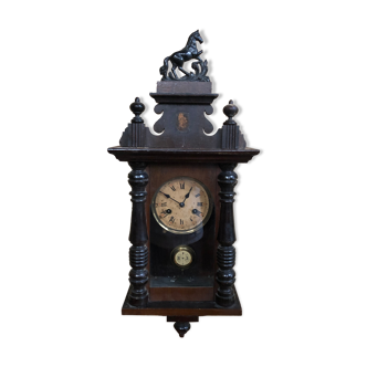 Mechanical pendulum clock with carved wood balance wheel & glass key