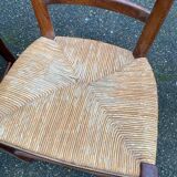 2 solid wood chairs with rush seats, child size.