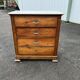 Antique 19th-century wooden chest of drawers with a marble top