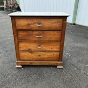 Antique 19th-century wooden chest of drawers with a marble top