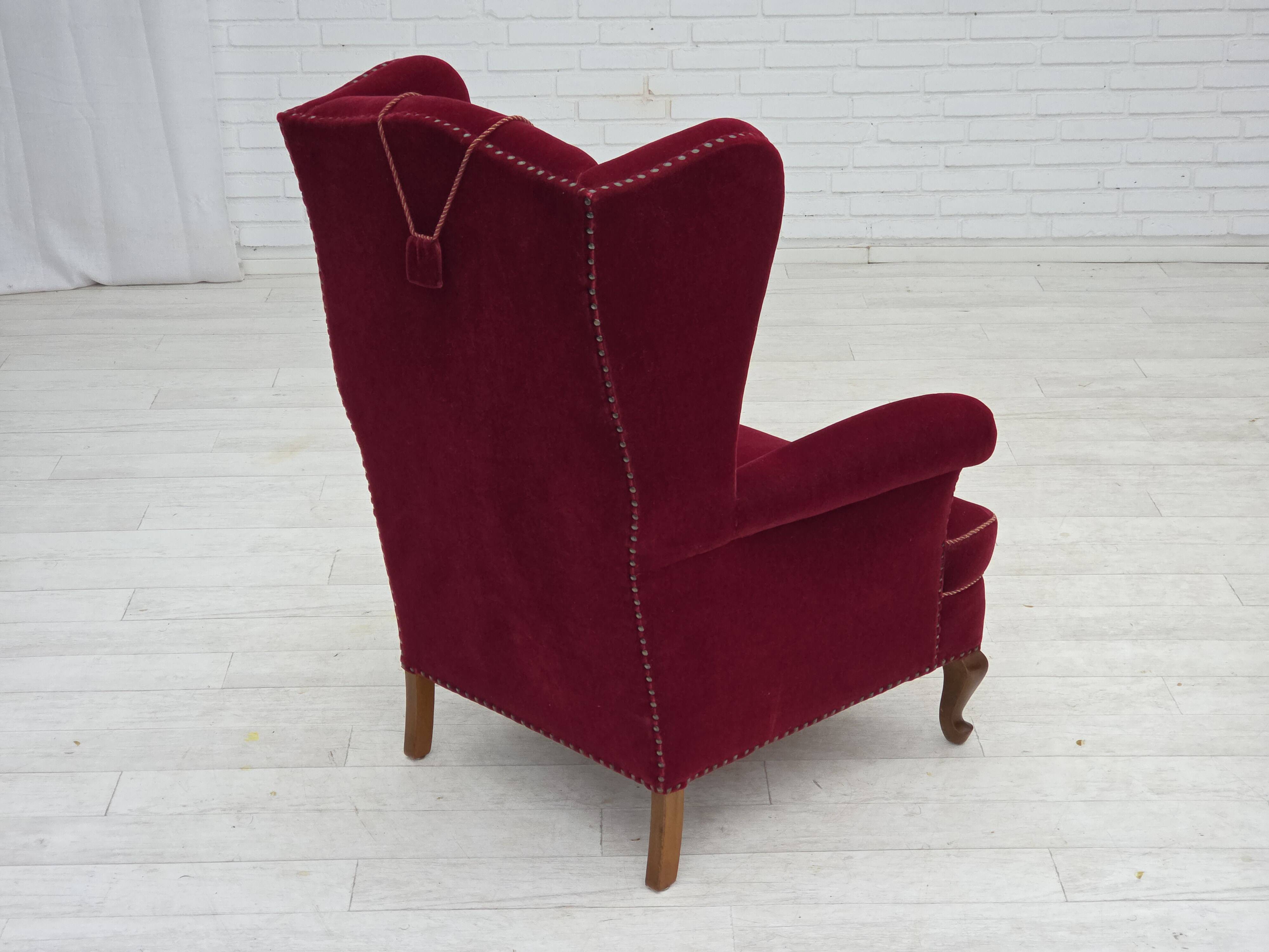 1960s, Danish highback wingback armchair, cherry-red furniture velour.