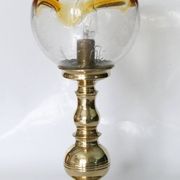 Table lamp in solid brass with a vintage 1970s glass globe.