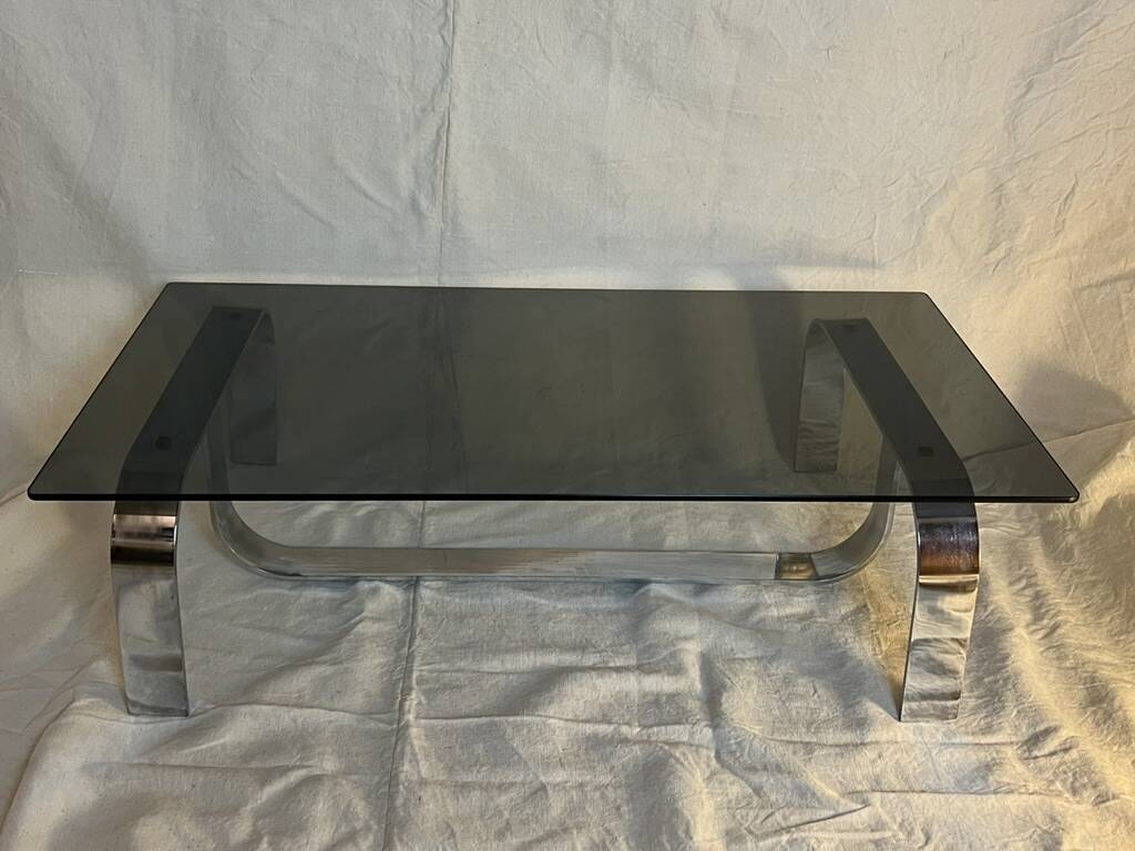 Vintage coffee table from the 70s in chrome and smoked glass, Space Age and Mid-Century style.