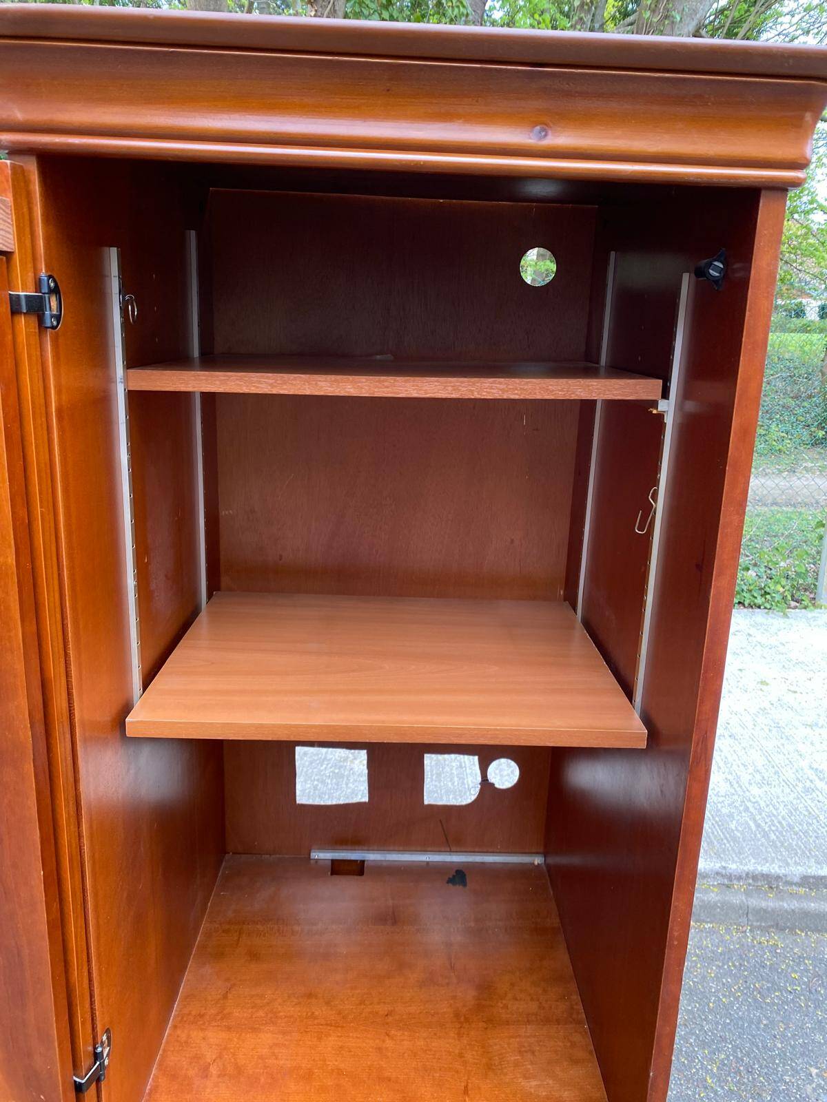 Louis Philippe wardrobe with a solid wood door.