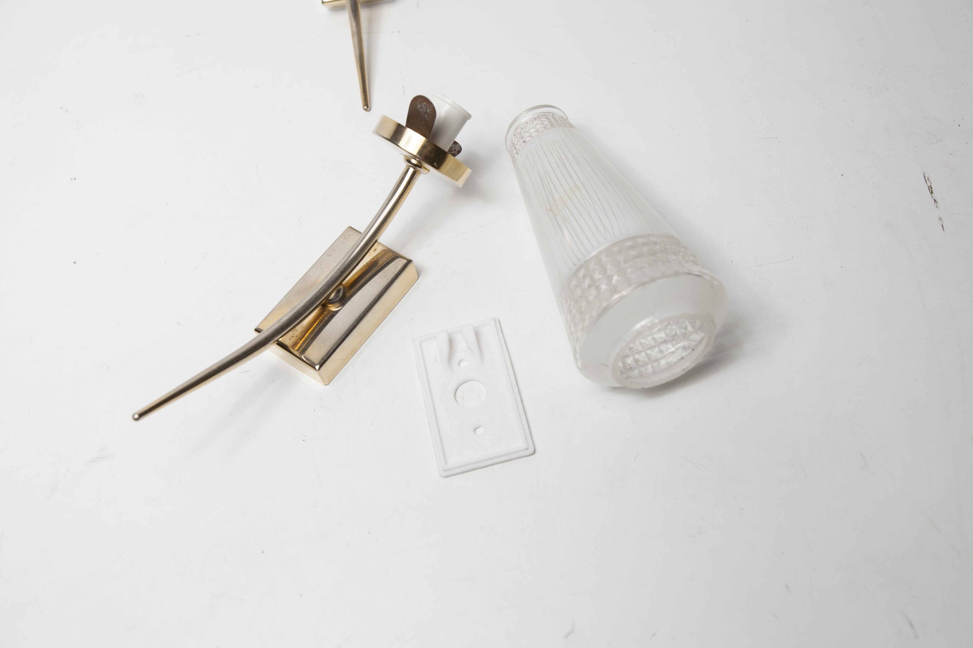 Pair of brass and white and transparent glass wall lights 1960