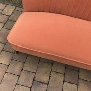 Coral mid-century cocktail canapé in fabric, solid beech legs — 1950