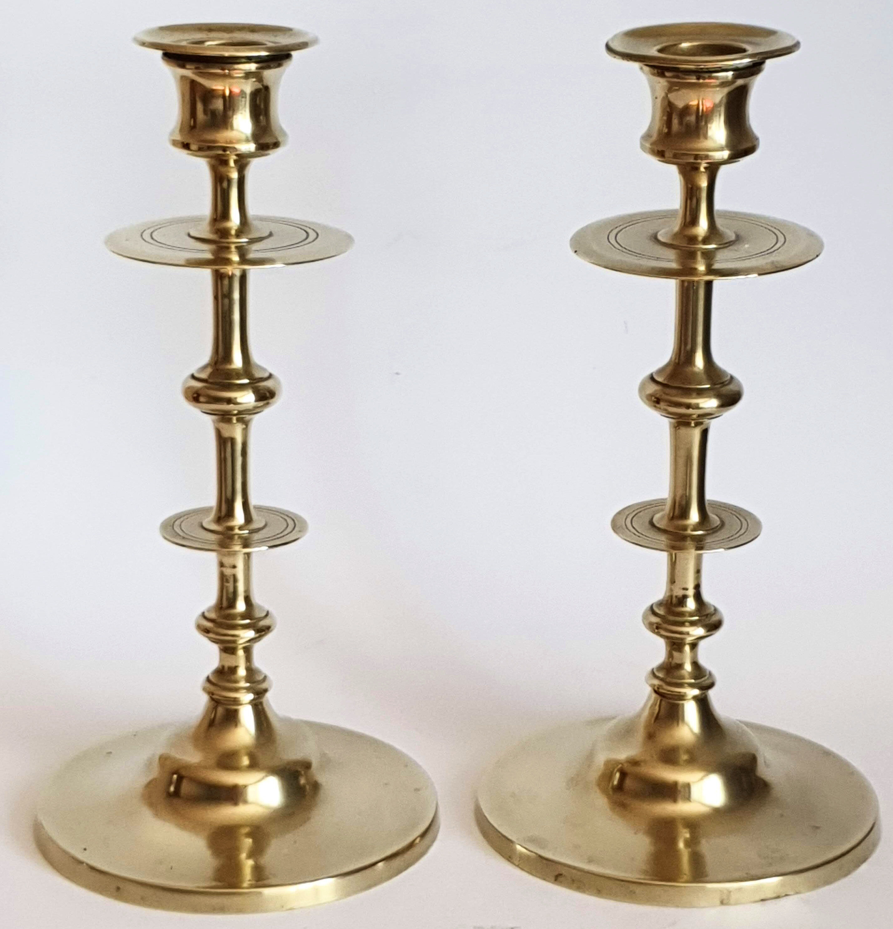 Duo of brass candle holders