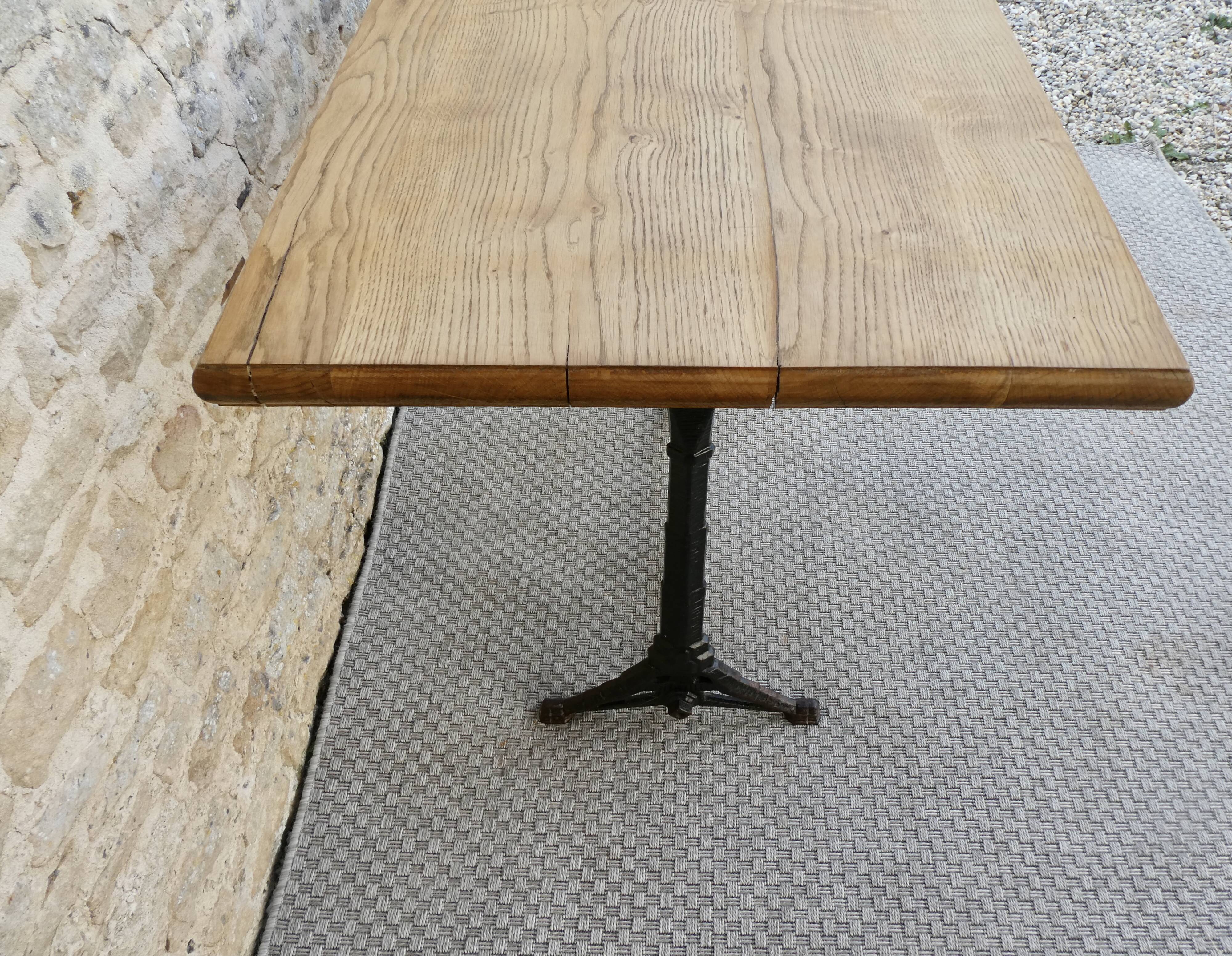 bistro table with cast iron legs signed Lelong, early 20th century