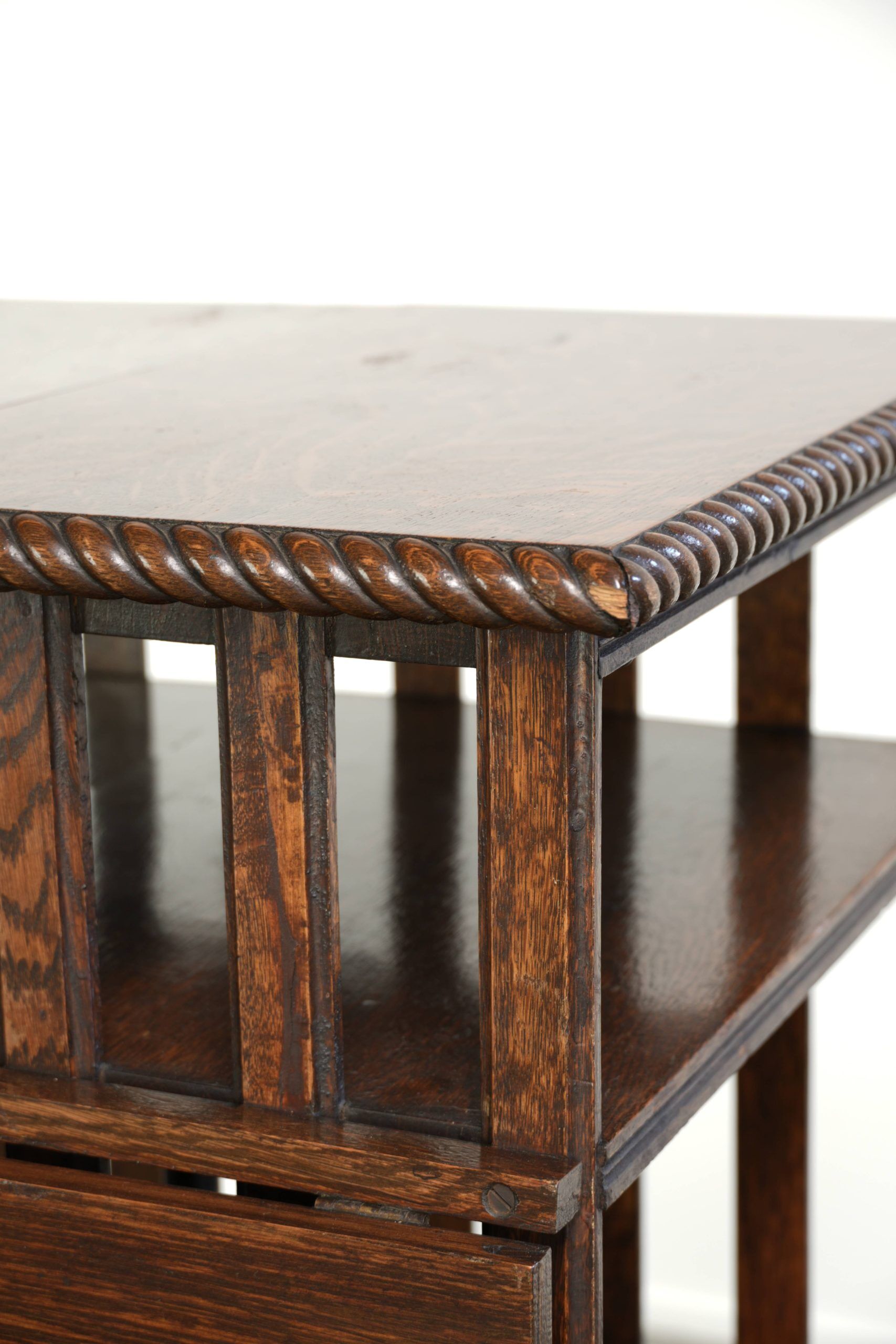 Large antique English oak book carousel from the 19th century