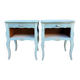 Pair of patinated lagoon blue bedside tables, early 20th century, with curved legs.