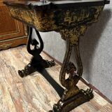 Lacquered work table, blackened wood decorated with Chinese scenes, Napoleon III period circa 1850