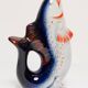 Set of 7 blue glass fish, mid-20th century.