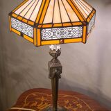 Bronze floor lamp from the 19th century with a handmade stained glass lampshade soldered with lead, measuring 52x26.