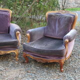 Two voltaire armchairs