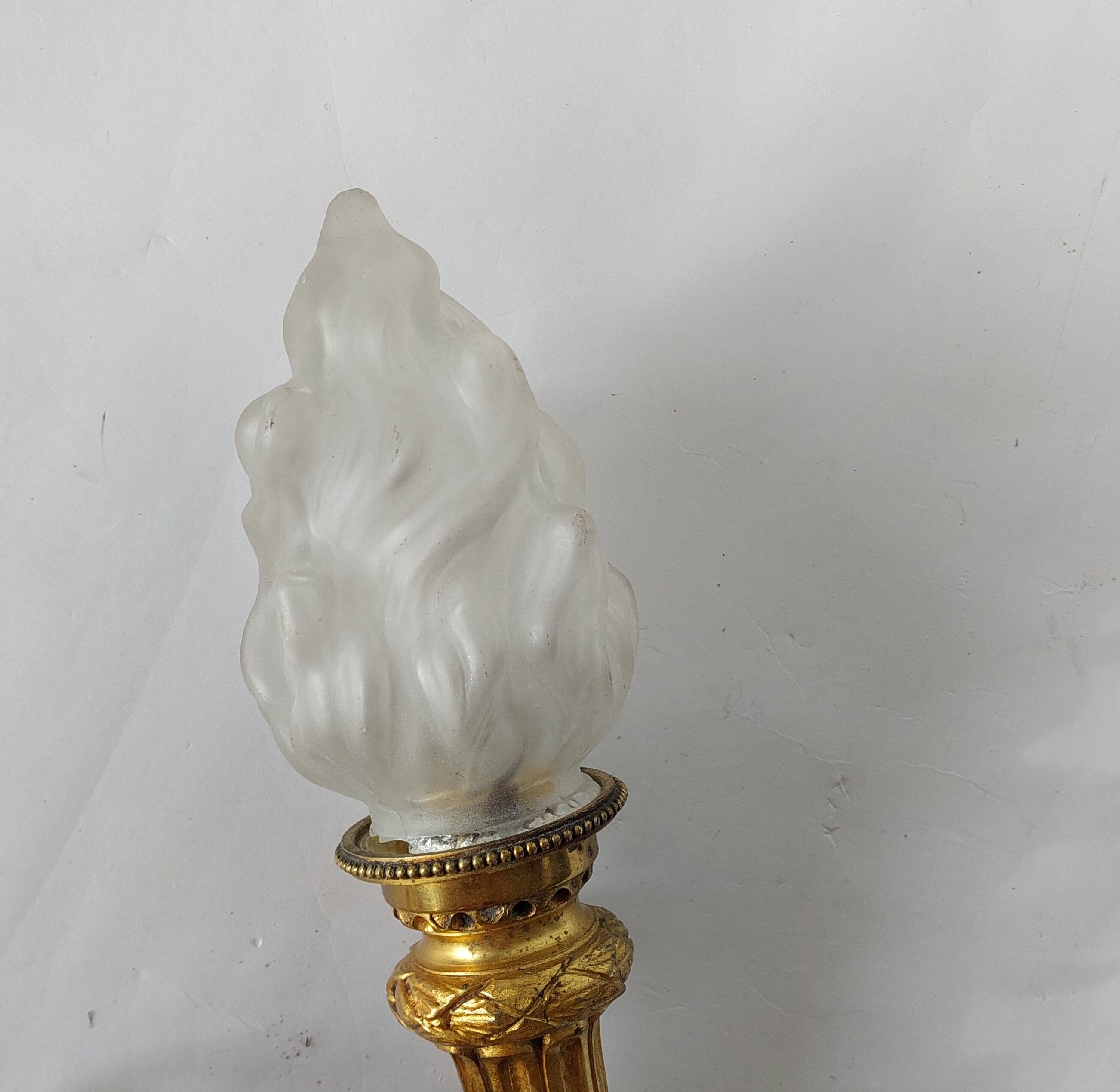 Torch wall lamp in gilded bronze Louis XVI Circa Napoleon III style.