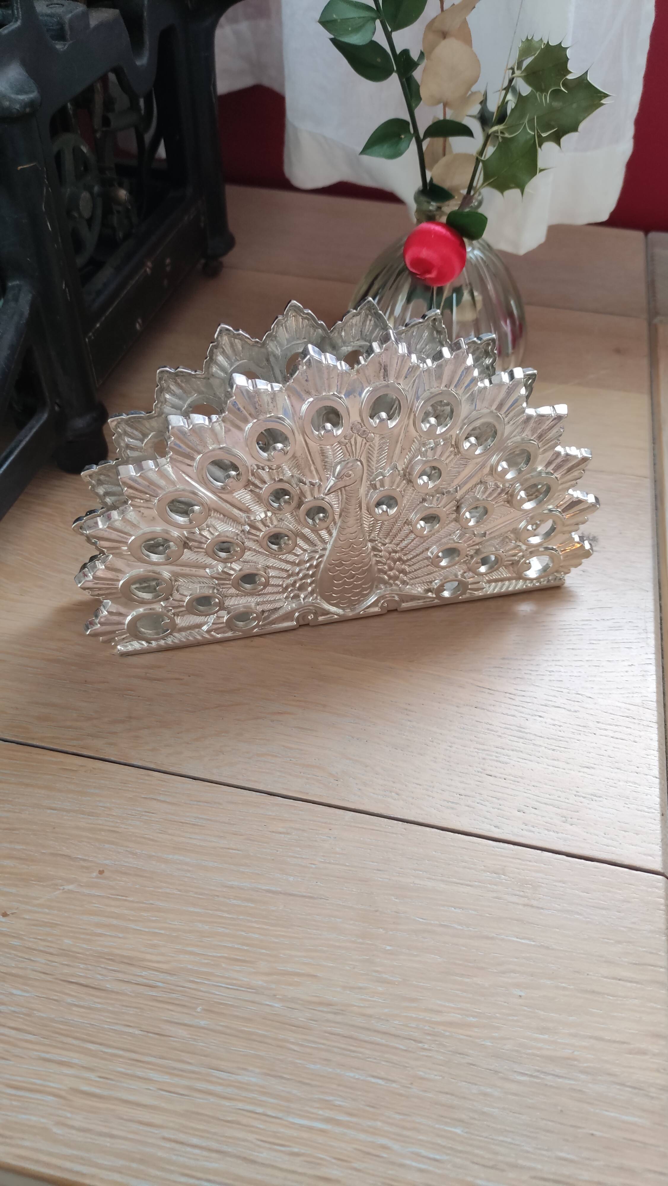 Peacock napkin holder in silver metal