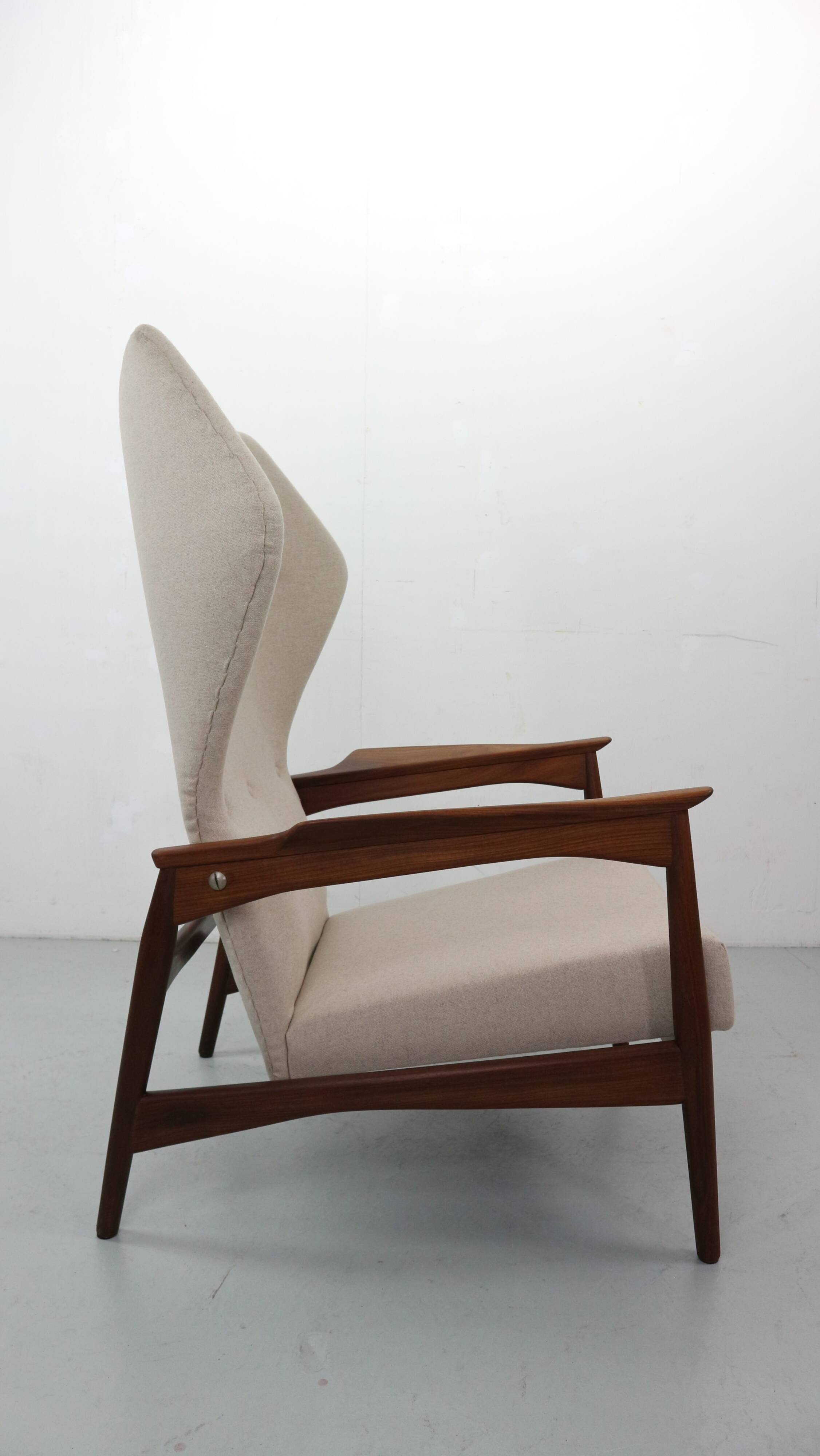 Danish adjustable wingback lounge chair in teak by Ib Kofod Larsen