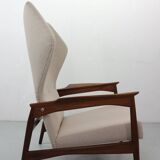 Danish adjustable wingback lounge chair in teak by Ib Kofod Larsen