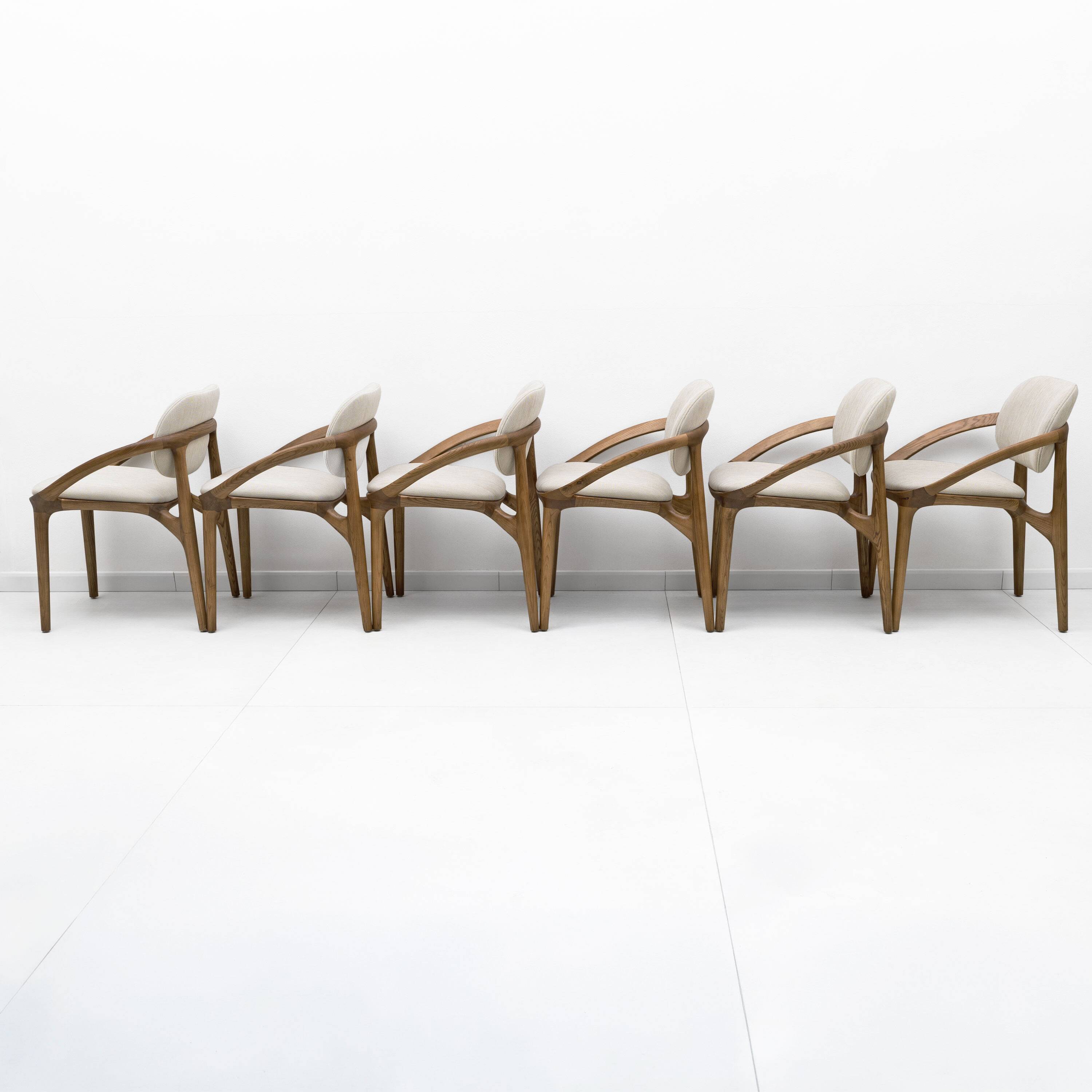 Set of Six Italian Contemporary Dining Chairs with Sculptural Curved Frame