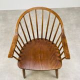 Baumann armchair with Scandinavian style bars, desk