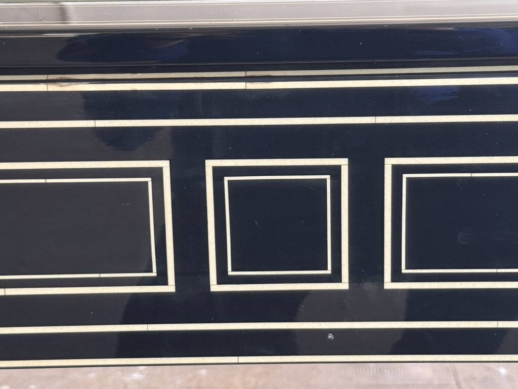 Maison Jansen black lacquered wooden desk from the 1960s with chair.
