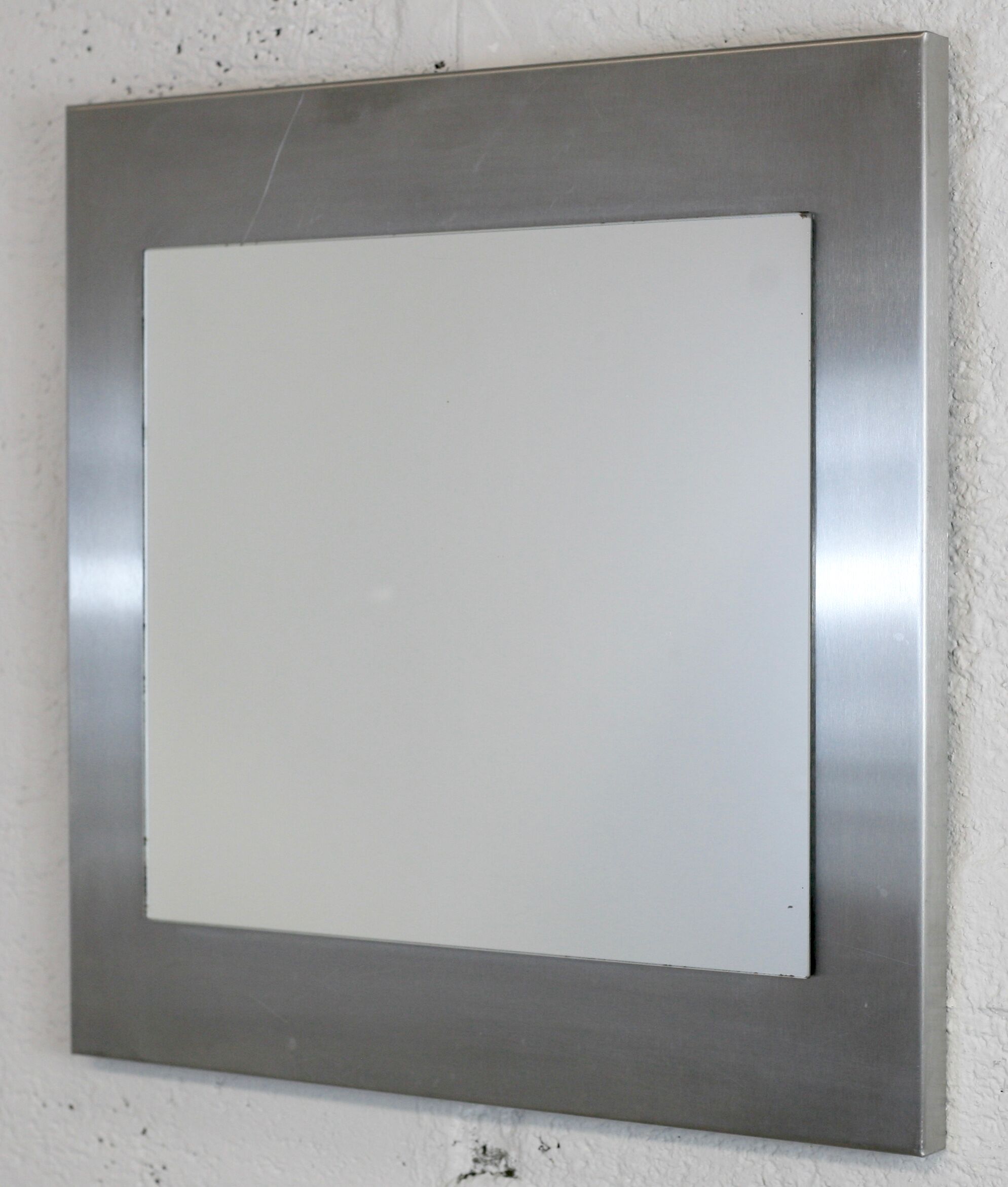 Mirror "space age". Stainless steel. France, circa 1970