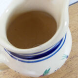 Pitcher in earthenware signed Henriot