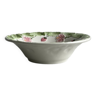 Ceramic slip dish with strawberry and flower pattern.