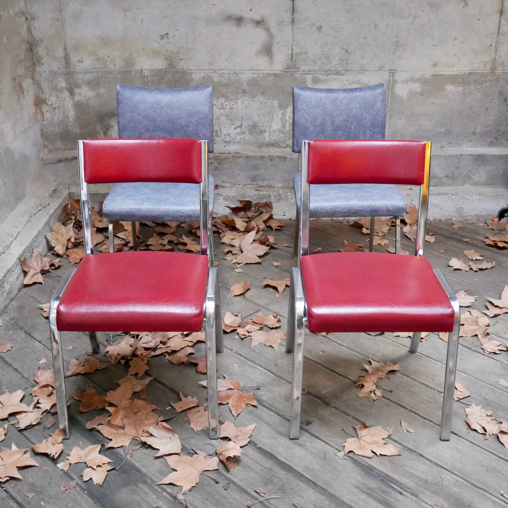 Pair of red leatherette chairs