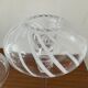 Pair of candle holders in glass paste