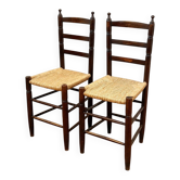 Pair of antique rush-seated chairs in solid wood – France, mid-20th century