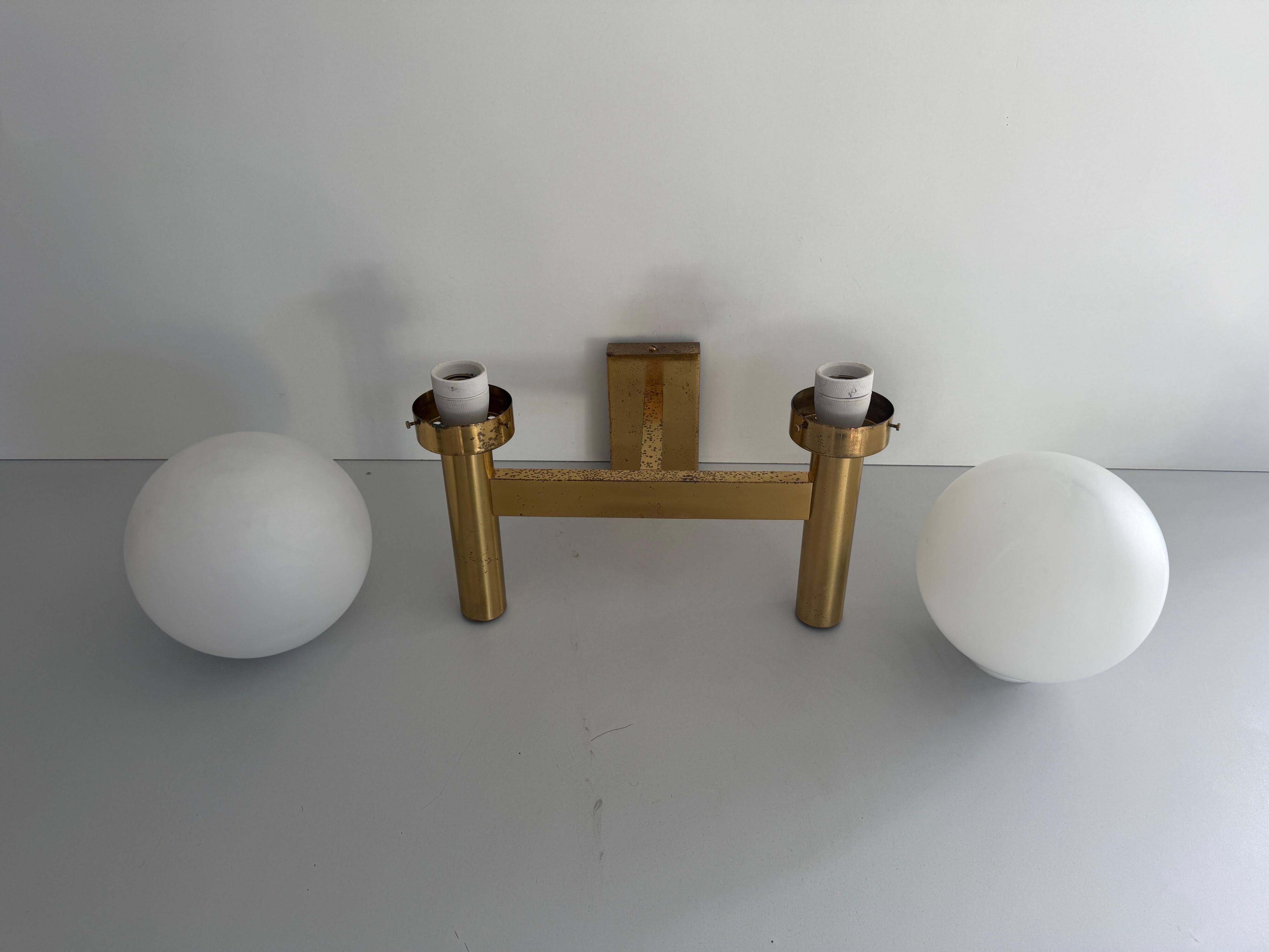 Double opal glass and heavy brass, large minimalist cinema wall light, 1960s, Germany