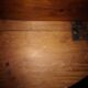 Round drop-leaf table in beech and pine