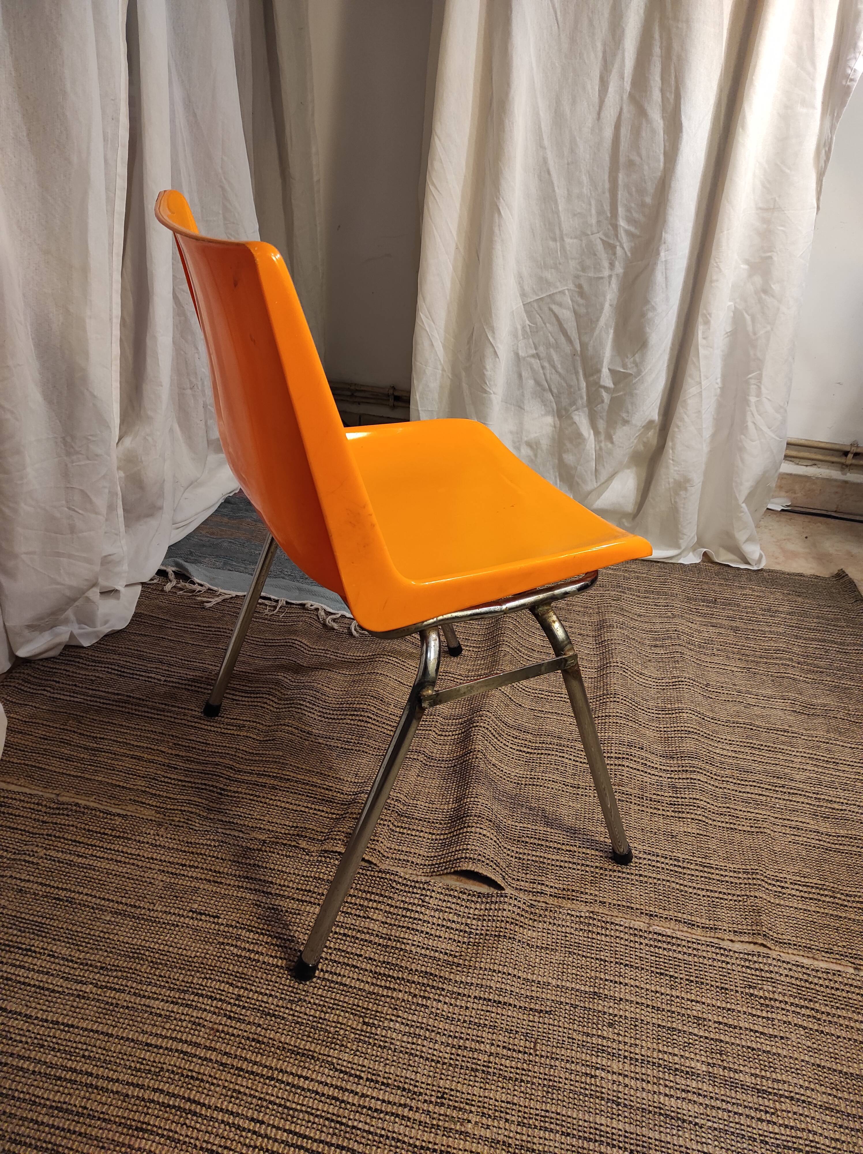 Orange plastic chair 1970