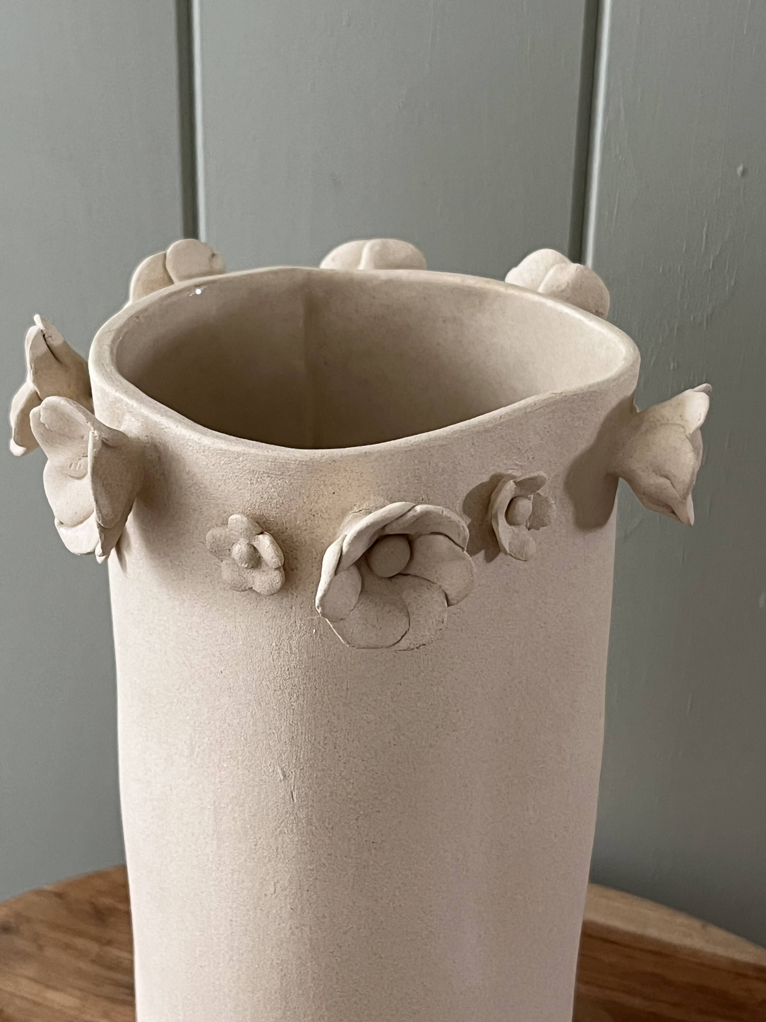 Stoneware vase with relief flowers