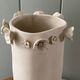 Stoneware vase with relief flowers